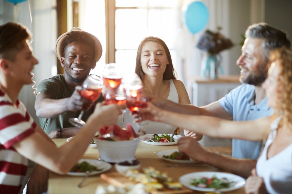 Family and students at table