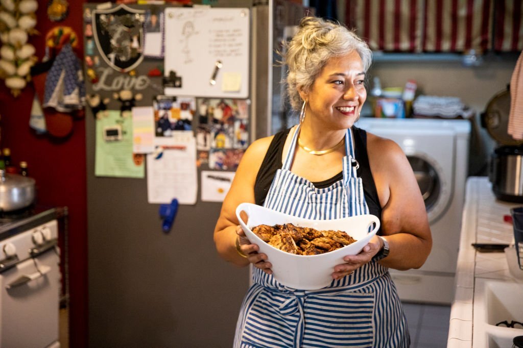 A woman getting ready for family dinner